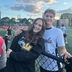 Eliana and Benni at a soccer match.